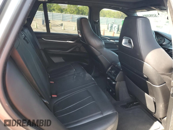 2016 BMW X5 M z VIN 5YMKT6C59G0R78590, wystawiony jako Copart lot #52993985 z przebiegiem Nie podano mil oraz Tytuł czysty. Historia ofert i sprzedaży dostępna na DreamBid. Obrazek 10.