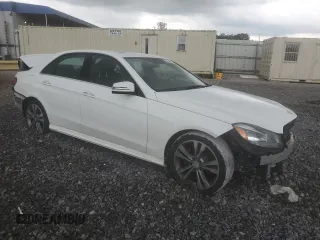 2014 Mercedes-Benz E 350 Sport with VIN WDDHF5KBXEB046711, listed as a Copart auction lot 54352405 with 158,855 mi miles and Salvage Title. Bid and sale history available at DreamBid. Image 4.
