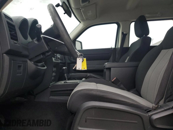2008 Dodge Nitro SXT with VIN 1D8GU28K08W285099, listed as a Copart auction lot 52709275 with 123,048 mi miles and Salvage Title. Bid and sale history available at DreamBid. Image 7.