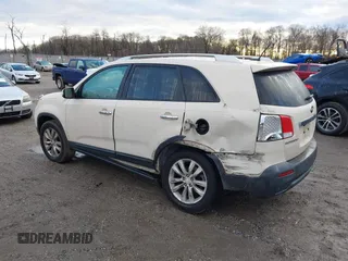 2011 Kia Sorento EX with VIN 5XYKU4A13BG003130, listed as a IAAI auction lot 41209337 with 162,058 mi miles. Bid and sale history available at carsss.com. Image 3.