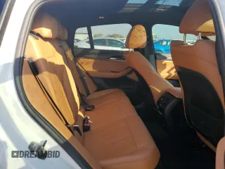2019 BMW X4 xDrive30i with VIN 5UXUJ3C5XKLG54286, listed as a Copart auction lot 77333284 with 99,771 mi miles and Salvage Title. Bid and sale history available at carsss.com. Image 11.