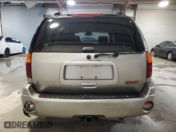 2002 GMC Envoy SLE with VIN 1GKDS13S622135607, listed as a Copart auction lot 84100254 with 298,811 mi miles and Salvage Title. Bid and sale history available at carsss.com. Image 6.