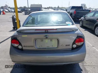2001 Nissan Maxima GXE with VIN JN1CA31D41T815592, listed as a IAAI auction lot 42465005 with 96,822 mi miles and . Bid and sale history available at DreamBid. Image 16.