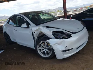 2021 Tesla Model Y Long Range with VIN 5YJYGAEE9MF254113, listed as a IAAI auction lot 42045256 with Not Provided miles. Bid and sale history available at carsss.com. Image 1.