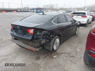 2016 Ford Fusion Energi SE Luxury with VIN 3FA6P0PU2GR322430, listed as a IAAI auction lot 42038508 with 114,980 mi miles. Bid and sale history available at carsss.com. Image 4.