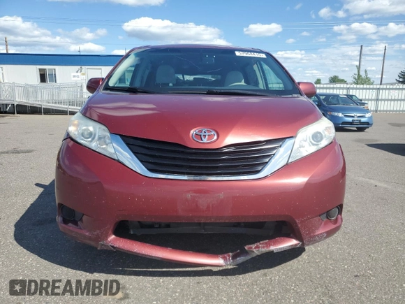 2012 Toyota Sienna LE AAS with VIN 5TDKK3DC7CS195590, listed as a Copart auction lot 57968415 with 201,732 mi miles and Salvage title. Bid and sale history available at DreamBid. Image 5.