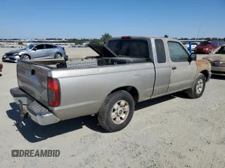 2000 Nissan Frontier XE with VIN 1N6DD26S5YC389400, listed as a Copart auction lot 63945485 with Not provided miles and Salvage title. Bid and sale history available at DreamBid. Image 3.
