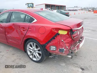 2015 Mazda 6 i Touring with VIN JM1GJ1V5XF1213756, listed as a IAAI auction lot 41943777 with 105,736 mi miles and . Bid and sale history available at carsss.com. Image 6.