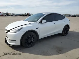 2023 Tesla Model Y Long Range z VIN 7SAYGDEE2PA065048, wystawiony jako Copart lot #48403655 z przebiegiem 56 553 mil mil oraz Szkoda całkowita • Salvage title. Historia ofert i sprzedaży dostępna na DreamBid. Obrazek 1.