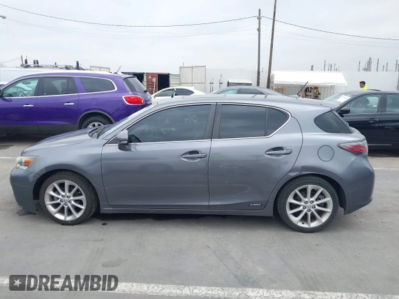 2013 Lexus CT 200h z VIN JTHKD5BH0D2167335, wystawiony jako IAAI lot #42374427 z przebiegiem 257 071 mil mil oraz . Historia ofert i sprzedaży dostępna na DreamBid. Obrazek 14.