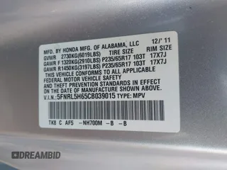 2012 Honda Odyssey EX-L with VIN 5FNRL5H65CB039015, listed as a IAAI auction lot 42612886 with 216,955 mi miles and . Bid and sale history available at DreamBid. Image 9.