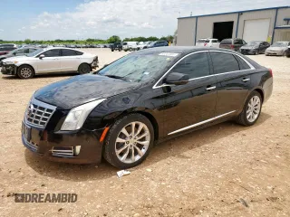 2015 Cadillac XTS Luxury with VIN 2G61M5S35F9258044, listed as a Copart auction lot 60243885 with 111,839 mi miles and Salvage title. Bid and sale history available at DreamBid. Image 1.