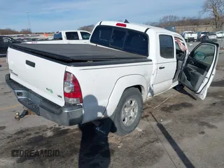 2015 Toyota Tacoma with VIN 3TMLU4EN8FM184297, listed as a IAAI auction lot 41759278 with 116,158 mi miles and . Bid and sale history available at DreamBid. Image 4.