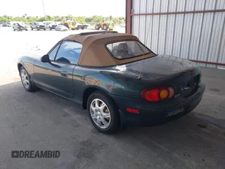1999 Mazda MX-5 Miata with VIN JM1NB3530X0133971, listed as a IAAI auction lot 42652996 with 19,270 mi miles and . Bid and sale history available at DreamBid. Image 3.