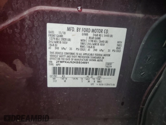 2019 Ford Edge SEL with VIN 2FMPK4J92KBB34891, listed as a Copart auction lot 60050945 with 104,942 mi miles and Salvage title. Bid and sale history available at DreamBid. Image 13.