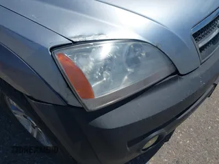 2004 Kia Sorento LX z VIN KNDJC733345270472, wystawiony jako IAAI lot #42282749 z przebiegiem 102 778 mil mil oraz . Historia ofert i sprzedaży dostępna na DreamBid. Obrazek 6.