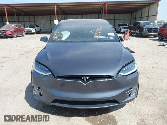 2017 Tesla Model X 90D with VIN 5YJXCBE22HF079194, listed as a IAAI auction lot 41895591 with 102,437 mi miles and . Bid and sale history available at DreamBid. Image 12.