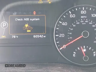 2018 Kia Optima SX z VIN 5XXGV4L21JG182103, wystawiony jako IAAI lot #40522762 z przebiegiem 60 542 mil mil oraz . Historia ofert i sprzedaży dostępna na DreamBid. Obrazek 15.