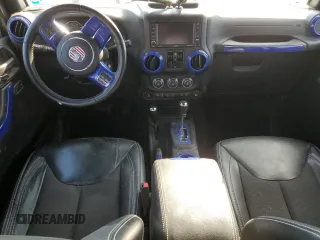 2018 Jeep Wrangler JK Unlimited Sport S with VIN 1C4BJWDG0JL842059, listed as a Copart auction lot 74382094 with 63,373 mi miles and Salvage Title. Bid and sale history available at carsss.com. Image 8.