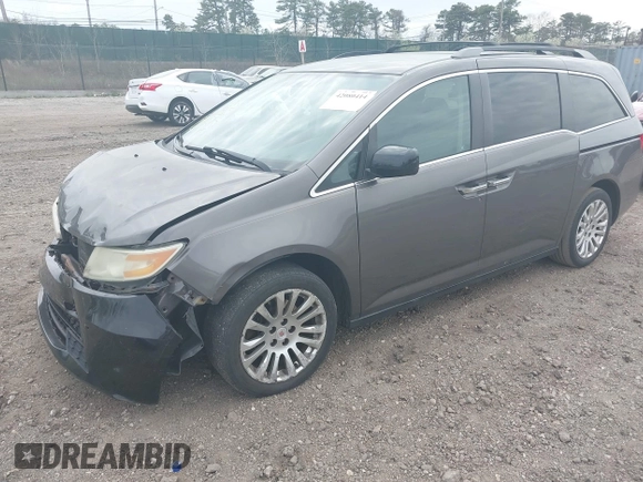 2011 Honda Odyssey EX with VIN 5FNRL5H49BB082706, listed as a IAAI auction lot 42080414 with 228,176 mi miles and . Bid and sale history available at carsss.com. Image 17.