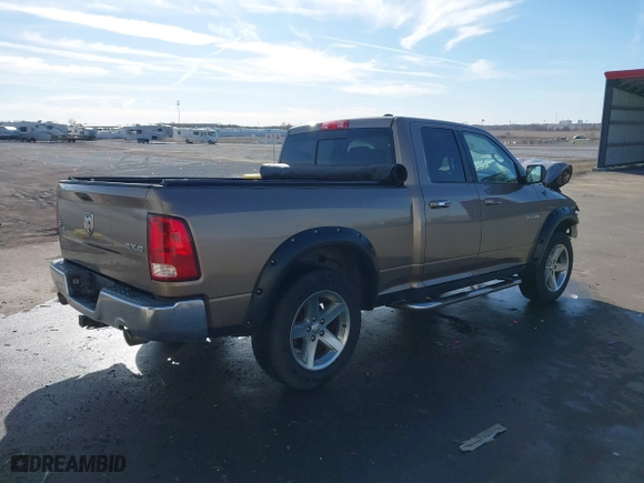 2009 Dodge Ram 1500 SLT with VIN 1D3HV18T39S795840, listed as a IAAI auction lot 41411466 with 124,917 mi miles. Bid and sale history available at carsss.com. Image 4.