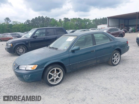 1997 Toyota Camry LE z VIN 4T1BG22K7VU005271, wystawiony jako IAAI lot #42098097 z przebiegiem Nie podano mil oraz . Historia ofert i sprzedaży dostępna na DreamBid. Obrazek 17.