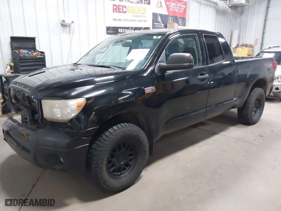 2013 Toyota Tundra 4WD Truck with VIN 5TFUW5F17DX305344, listed as a IAAI auction lot 41310441 with 291,061 mi miles. Bid and sale history available at carsss.com. Image 2.