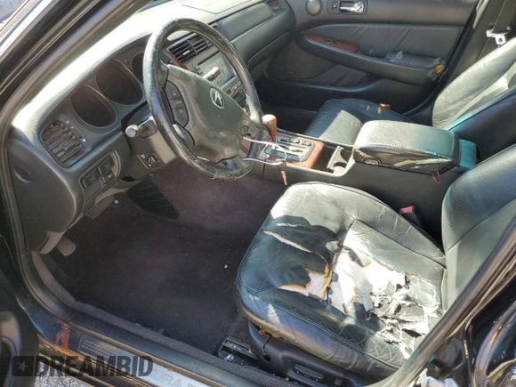 2004 Acura RL w/Navigation System with VIN JH4KA96624C004656, listed as a Copart auction lot 77021014 with 158,857 mi miles and Salvage Title. Bid and sale history available at carsss.com. Image 7.