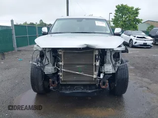 2016 Infiniti QX80 z VIN JN8AZ2NC0G9403107, wystawiony jako IAAI lot #42232384 z przebiegiem 98 763 mil mil oraz . Historia ofert i sprzedaży dostępna na DreamBid. Obrazek 13.