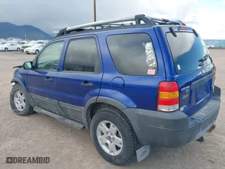 2005 Ford Escape XLT with VIN 1FMYU93155KB49222, listed as a IAAI auction lot 42055463 with 208,866 mi miles. Bid and sale history available at carsss.com. Image 3.