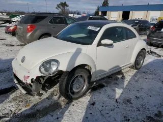 2012 Volkswagen Beetle 2.5L w/Sun/Sound/Nav PZEV with VIN 3VWHP7AT3CM627340, listed as a Copart auction lot 42633385 with 115,862 mi miles and Salvage Title. Bid and sale history available at carsss.com. Image 1.