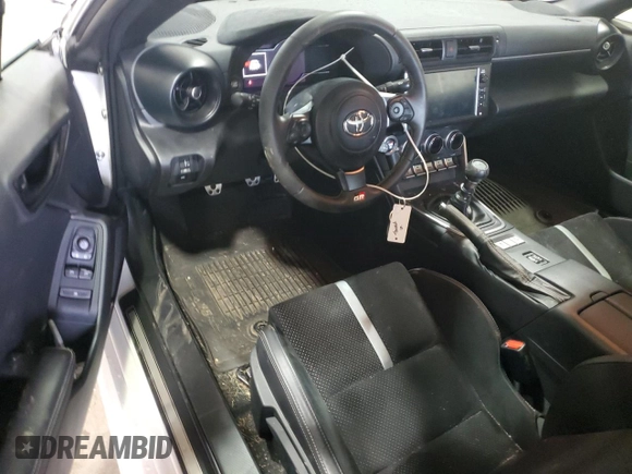 2023 Toyota GR86 Premium with VIN JF1ZNBE10P9765758, listed as a Copart auction lot 72064734 with 9,651 mi miles and Salvage Title. Bid and sale history available at carsss.com. Image 8.
