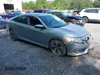 2016 Honda Civic EX-T with VIN 19XFC1F30GE206834, listed as a IAAI auction lot 42487962 with 182,618 mi miles and . Bid and sale history available at DreamBid. Image 1.