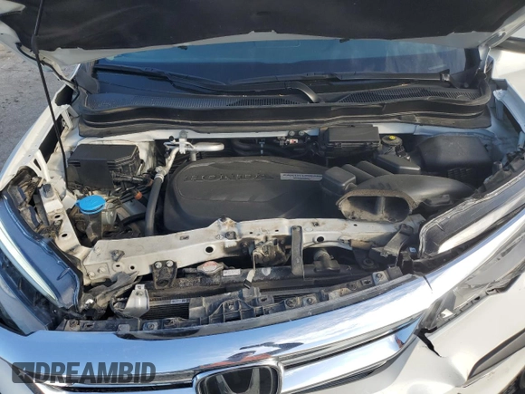 2020 Honda Pilot Elite with VIN 5FNYF6H01LB047889, listed as a Copart auction lot 54593715 with 63,534 mi miles and Salvage title. Bid and sale history available at DreamBid. Image 12.