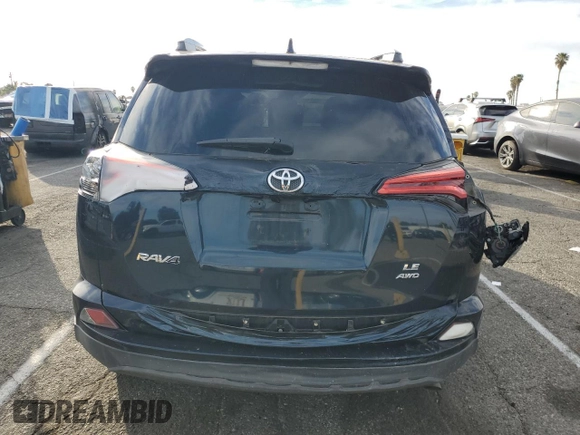 2017 Toyota RAV4 LE with VIN 2T3BFREV4HW660064, listed as a Copart auction lot 43660485 with 100,225 mi miles and Salvage Title. Bid and sale history available at DreamBid. Image 6.