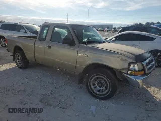 1999 Ford Ranger XLT with VIN 1FTYR14X1XPB75400, listed as a Copart auction lot 80879084 with 255,136 mi miles and Salvage Title. Bid and sale history available at DreamBid. Image 4.