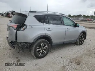 2018 Toyota RAV4 XLE with VIN 2T3WFREV4JW444884, listed as a Copart auction lot 55666275 with 174,275 mi miles and Salvage Title. Bid and sale history available at DreamBid. Image 3.