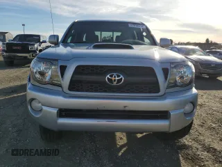 2011 Toyota Tacoma PreRunner with VIN 3TMJU4GN7BM114871, listed as a Copart auction lot 87256214 with 214,236 mi miles and Salvage Title. Bid and sale history available at DreamBid. Image 5.