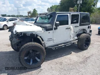 2016 Jeep Wrangler Unlimited Sport with VIN 1C4BJWDGXGL335825, listed as a IAAI auction lot 28960589 with 28,515 mi miles and . Bid and sale history available at DreamBid. Image 17.