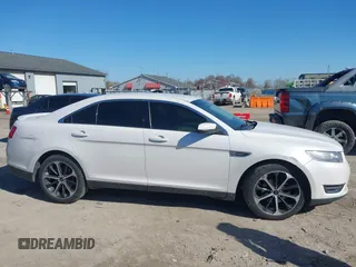 2014 Ford Taurus SEL z VIN 1FAHP2E81EG104137, wystawiony jako IAAI lot #42054432 z przebiegiem 146 046 mil mil oraz . Historia ofert i sprzedaży dostępna na DreamBid. Obrazek 13.