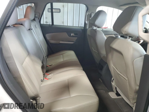 2014 Ford Edge SEL z VIN 2FMDK4JC9EBB53117, wystawiony jako Copart lot #61017115 z przebiegiem 118 071 mil mil oraz Nie do naprawy • Non repairable. Historia ofert i sprzedaży dostępna na DreamBid. Obrazek 11.