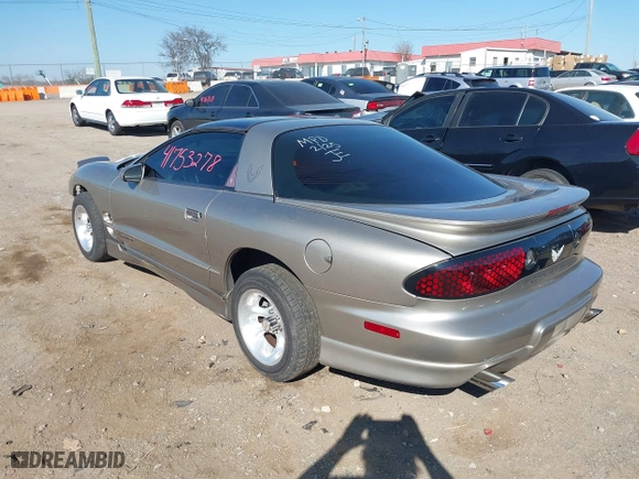 2000 Pontiac Firebird with VIN 2G2FS22K0Y2147688, listed as a IAAI auction lot 41753278 with 166,861 mi miles. Bid and sale history available at carsss.com. Image 3.