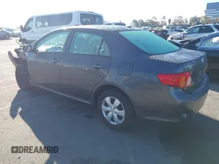 2009 Toyota Corolla with VIN 1NXBU40E09Z147694, listed as a IAAI auction lot 41741275 with 170,912 mi miles. Bid and sale history available at carsss.com. Image 3.