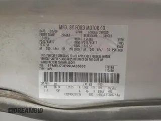 2009 Ford Explorer XLT with VIN 1FMEU73E99UA35633, listed as a Copart auction lot 50572125 with 124,471 mi miles and Salvage title. Bid and sale history available at DreamBid. Image 14.