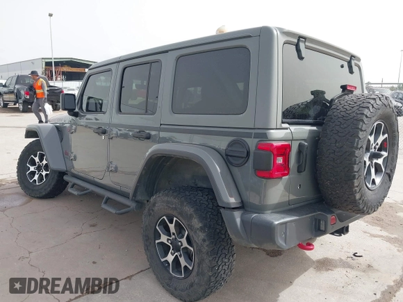 2020 Jeep Wrangler Unlimited Rubicon z VIN 1C4HJXFG2LW267154, wystawiony jako IAAI lot #41745497 z przebiegiem 28 692 mil mil oraz . Historia ofert i sprzedaży dostępna na DreamBid. Obrazek 3.