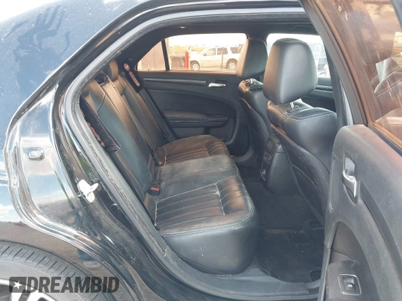 2014 Chrysler 300 S with VIN 2C3CCABG5EH205020, listed as a IAAI auction lot 42247180 with 186,458 mi miles and . Bid and sale history available at DreamBid. Image 8.