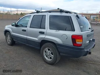 2004 Jeep Grand Cherokee Laredo with VIN 1J4GW48N14C434351, listed as a IAAI auction lot 41860077 with 152,404 mi miles. Bid and sale history available at carsss.com. Image 3.