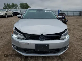 2012 Volkswagen Jetta TDI w/Premium & Nav z VIN 3VWLL7AJ8CM365576, wystawiony jako Copart lot #56728245 z przebiegiem 102 088 mil mil oraz Szkoda całkowita • Salvage title. Historia ofert i sprzedaży dostępna na DreamBid. Obrazek 5.