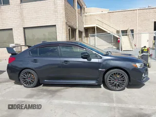 2015 Subaru WRX STI z VIN JF1VA2P68F9823116, wystawiony jako IAAI lot #41842139 z przebiegiem 95 710 mil mil oraz . Historia ofert i sprzedaży dostępna na DreamBid. Obrazek 14.