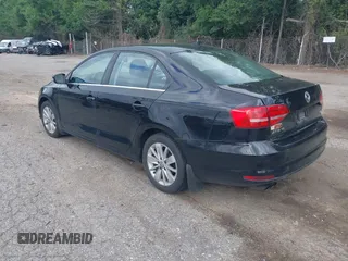 2015 Volkswagen Jetta SE z VIN 3VWD17AJXFM338250, wystawiony jako IAAI lot #42651860 z przebiegiem 119 751 mil mil oraz . Historia ofert i sprzedaży dostępna na DreamBid. Obrazek 3.